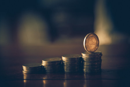 row of coins in banking and finance concept