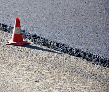 Repair of the road  Freshly asphalt cone-limitingの写真素材