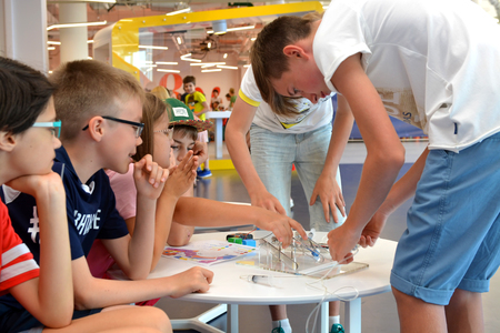 SOCHI, RUSSIA - June 24, 2017: Children  make robots at an open lesson of the All-Russia Educational...