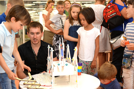 SOCHI, RUSSIA - June 24, 2017: Junior schoolchildren enthusiastically listen to the explanations of the teacher in robotics at an open lesson of the All-Russian Educational Center "Sirius"のeditorial素材