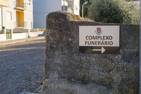 Castelo Branco, Portugal - March 06 2022: Sign pointing right to Castelo Branco funeral complex in central Portugalのeditorial素材