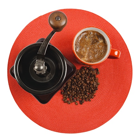 Photo of coffee grinder and a fresh cup of natural coffeeの写真素材
