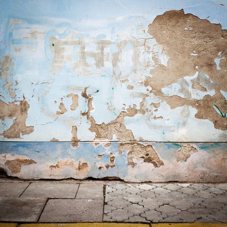 Urban grungy street wall, may be used as background or textureの写真素材