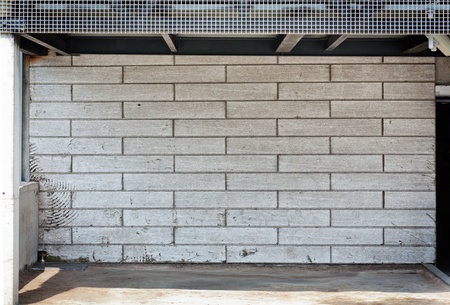 Urban grungy street wall, may be used as background or textureの写真素材