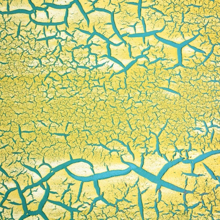 Close-up detail of cracked paint on wall.の写真素材