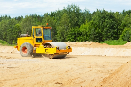 Roller preparing ground for building a new roadの写真素材