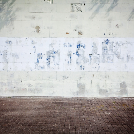 Urban grungy street wall, may be used as background or textureの写真素材