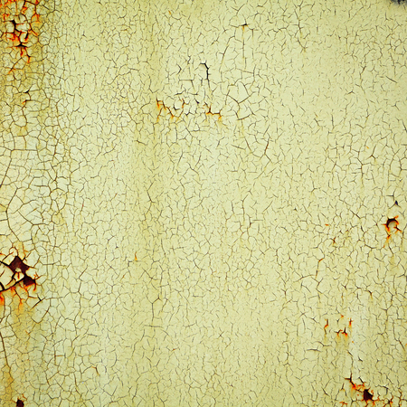 Close-up detail of cracked paint on wall.の写真素材