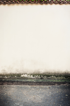 Urban grungy street wall, may be used as background or textureの写真素材