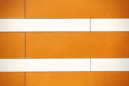 Empty lined orange street wallの写真素材