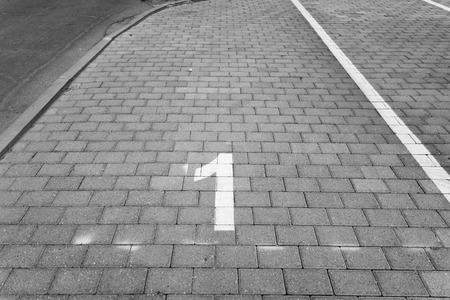 Empty parking spot with a numberの写真素材