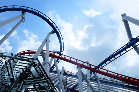 Rollercoaster against blue skyの写真素材