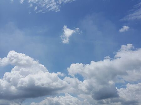 Blue sky and cloud imade backgroundの写真素材