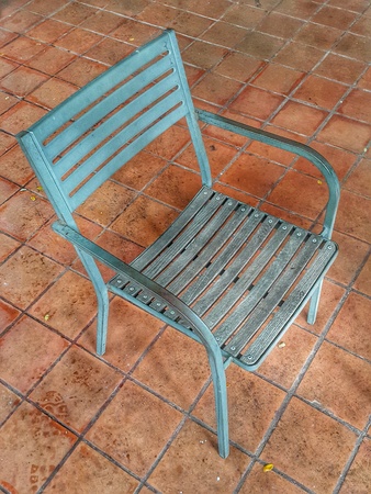 wood chair with steel in garden at coffee shopの写真素材