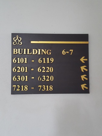 building guide post sign with number in hotelの写真素材