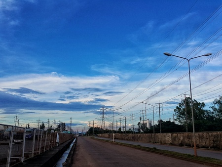 Blue sky with white cloud backgroundの写真素材