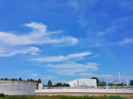 Blue sky with white cloud backgroundの写真素材
