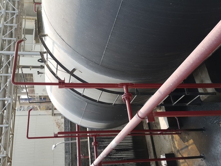 Storage bunker- c tank  inside the used oil room, and that tank was also heated by steam and have explosion proof equipment  for  valve,motor, pump and fire protectionの写真素材