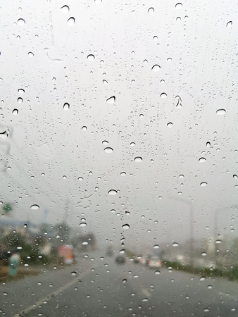 water drop on carglass in rainny dayの写真素材