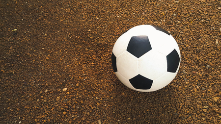 white and black ball  on small stone floor backgroundの写真素材
