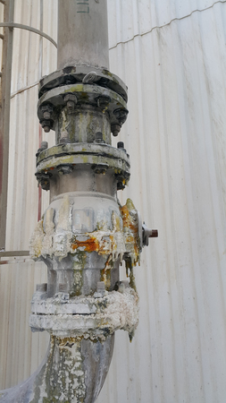 Old valves and rust steel affect from  corrosive environment on skinの写真素材