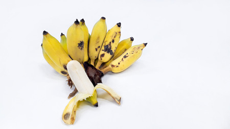 The banana peel is not beautiful. Cultivated banana on white isolatedの写真素材
