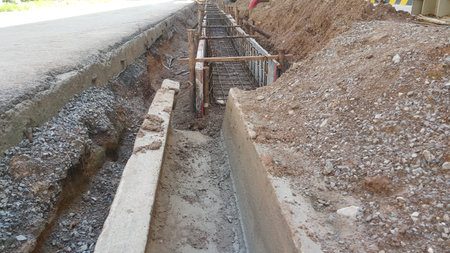 Concrete waterspout on a construction site , Equipment and tools are working on construction site.