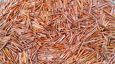 Copper wire is cut into pieces for recycling  on white  background.