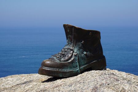 Pilgrim boot on Cape Finisterreの写真素材
