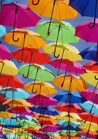 Colorful umbrellas floatingの写真素材