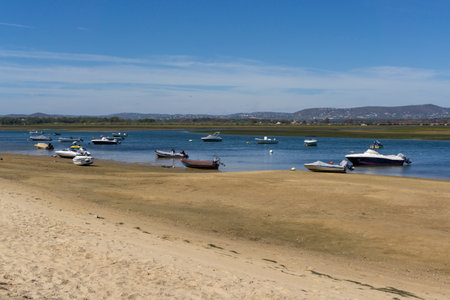 Fishing and recreational boats moored at Cabanas de Tavira, Portugalの写真素材