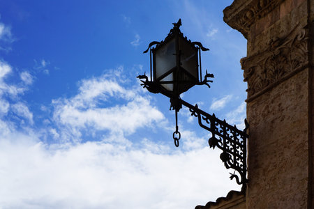 Ancient and medieval lamp in Assisi italian historic villageの写真素材
