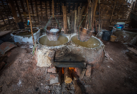 The traditional way of life is to boil the ancient mountain salt. At Amphoe Bo Kluea ,Nan province , Thailand (HDR.Image has grain or blurry or noise when view at full resolution)のeditorial素材