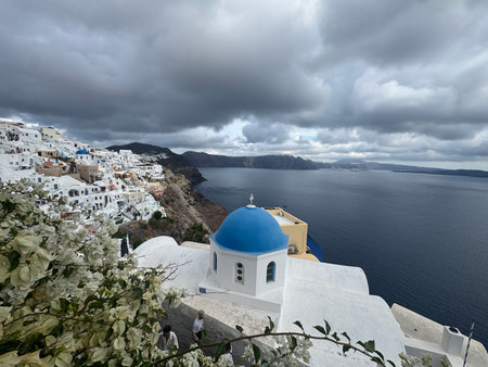 Santorini island, Greece. View of the sea and blue domed church.の写真素材