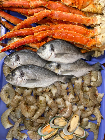 Seafood on ice at a market in Santorini, Greece.の写真素材