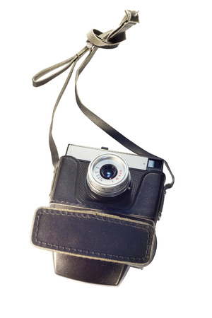 The old camera hanging on a nailの写真素材