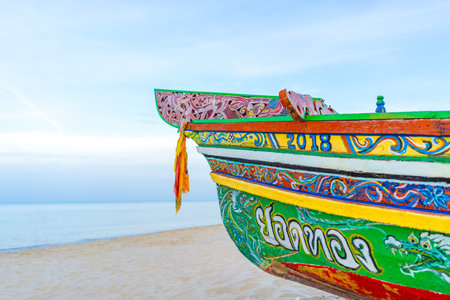 Local fishing boat on the beachの写真素材