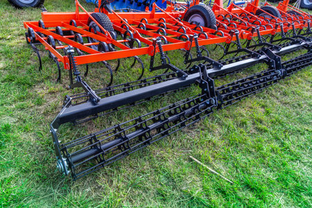 Russia, Leningrad Region - June, 2019: Working bodies of equipment for land cultivation....