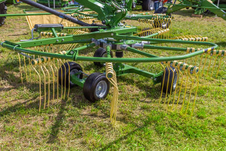 Russia, Leningrad Region - June, 2019: brand Krone rotary rakes at the exhibitionのeditorial素材