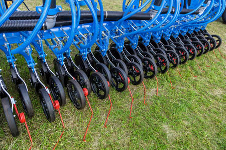 Russia, Leningrad Region - June, 2019: Working bodies of equipment for land cultivation. Agricultural machinery.のeditorial素材