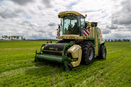 Russia, Leningrad Region - June, 2019: Powerful combine brand Krone at the exhibitionのeditorial素材