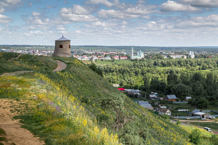 The tower of an ancient Bulgarian fortress on a high cliff on the banks of the Kama River, Elabuga,...