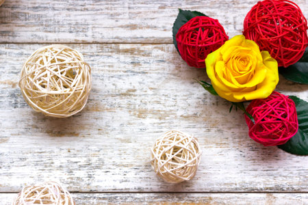 Beautiful yellow roses on a wooden backgroundの写真素材