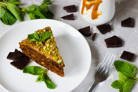 Chocolate cake with pistachios and salted caramel