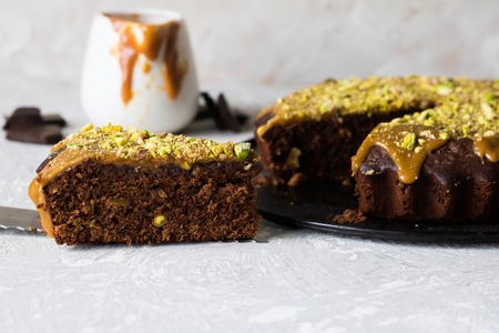 Chocolate cake with pistachios and salted caramelの写真素材