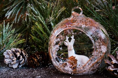 Christmas and Christmas decorative elements and toys on a wooden backgroundの写真素材