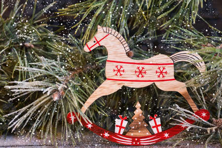 Christmas and Christmas decorative elements and toys on a wooden backgroundの写真素材