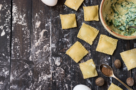 The process of making ravioli with ricotta, spinach and nutmegの写真素材