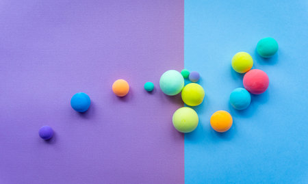 Colorful abstract figures made of plasticine, Balls of different sizes. Funny illustration for the background of childrens holidays, frame for textの写真素材