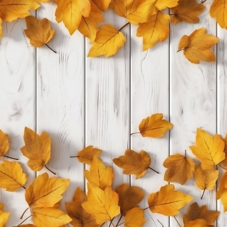 Autumn leaves on white wooden background. Flat lay, top viewの素材